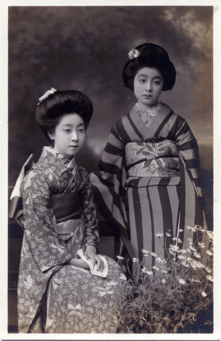 Two onnanoko [young women] posing, c. 1910.