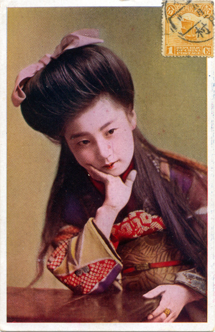 Bijin (pretty girl) posting with Western coiffure, c. 1910.