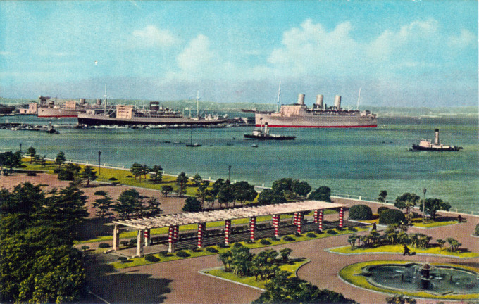 Yamashita Park, Yokohama, with the Hikawa Maru (black hull) berthed at center, c. 1960.