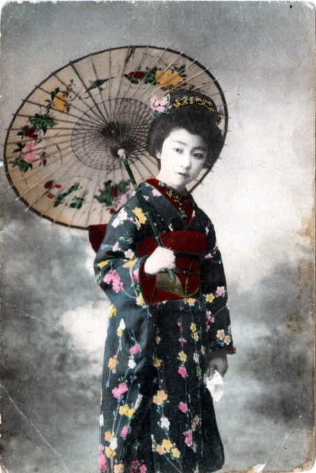 Onnanoko with Japanese umbrella, c. 1910.