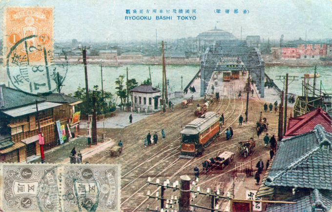 Elevated view of Ryogoku Bridge, c. 1910, with Kokugikan in the distance.